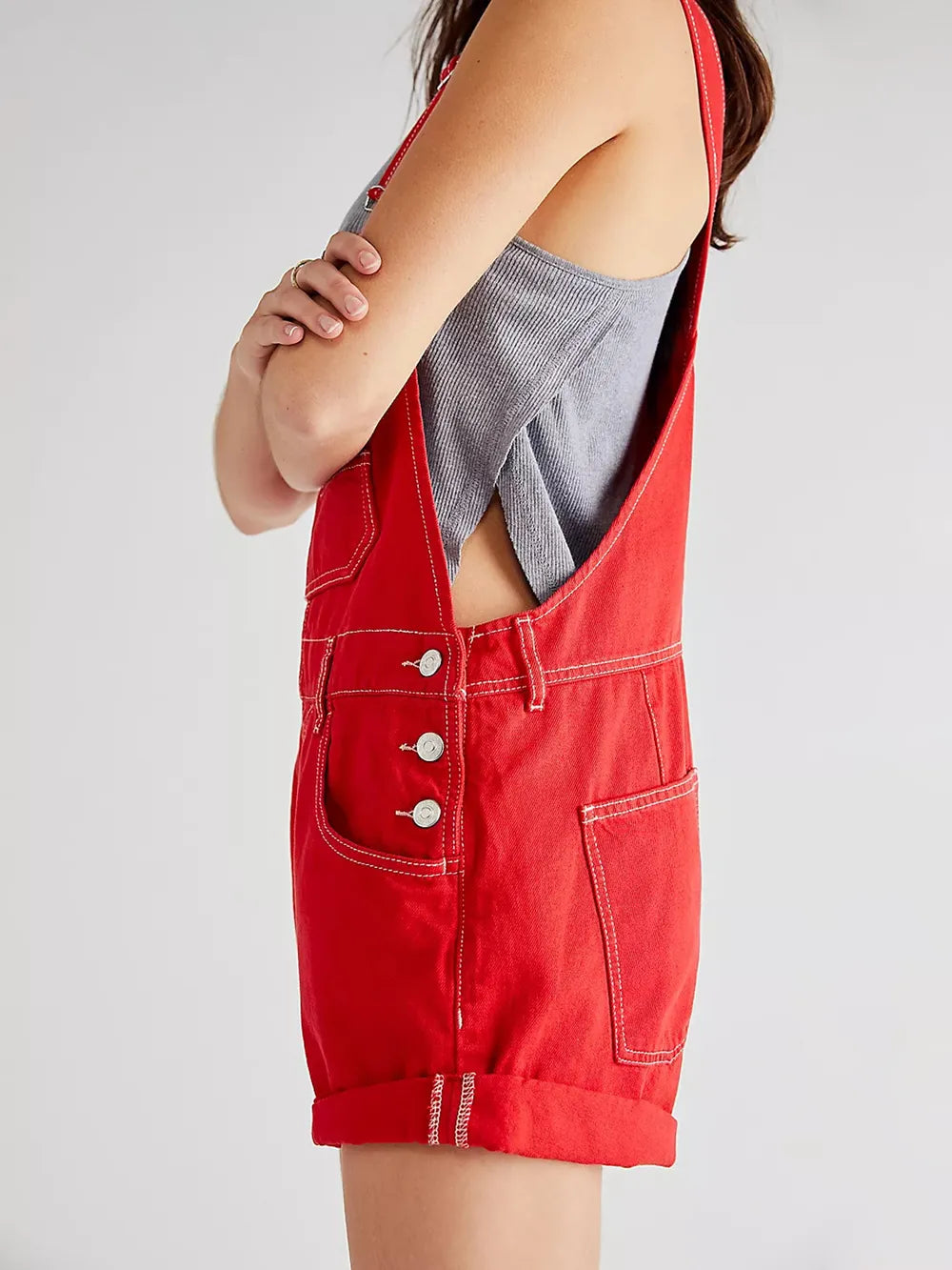 Scarlet denim overalls back view showing crisscross straps