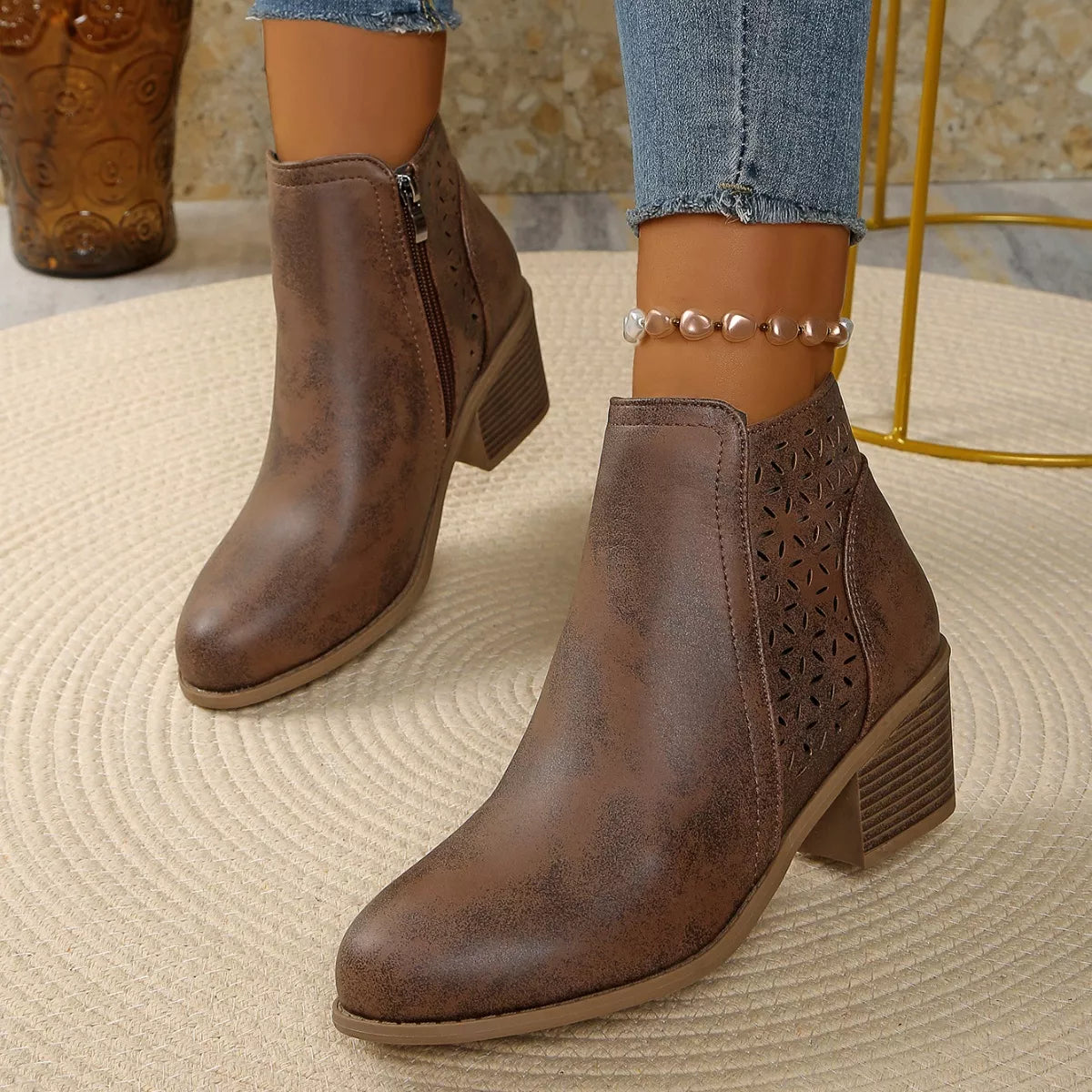 Point toe block heel boots styled with denim