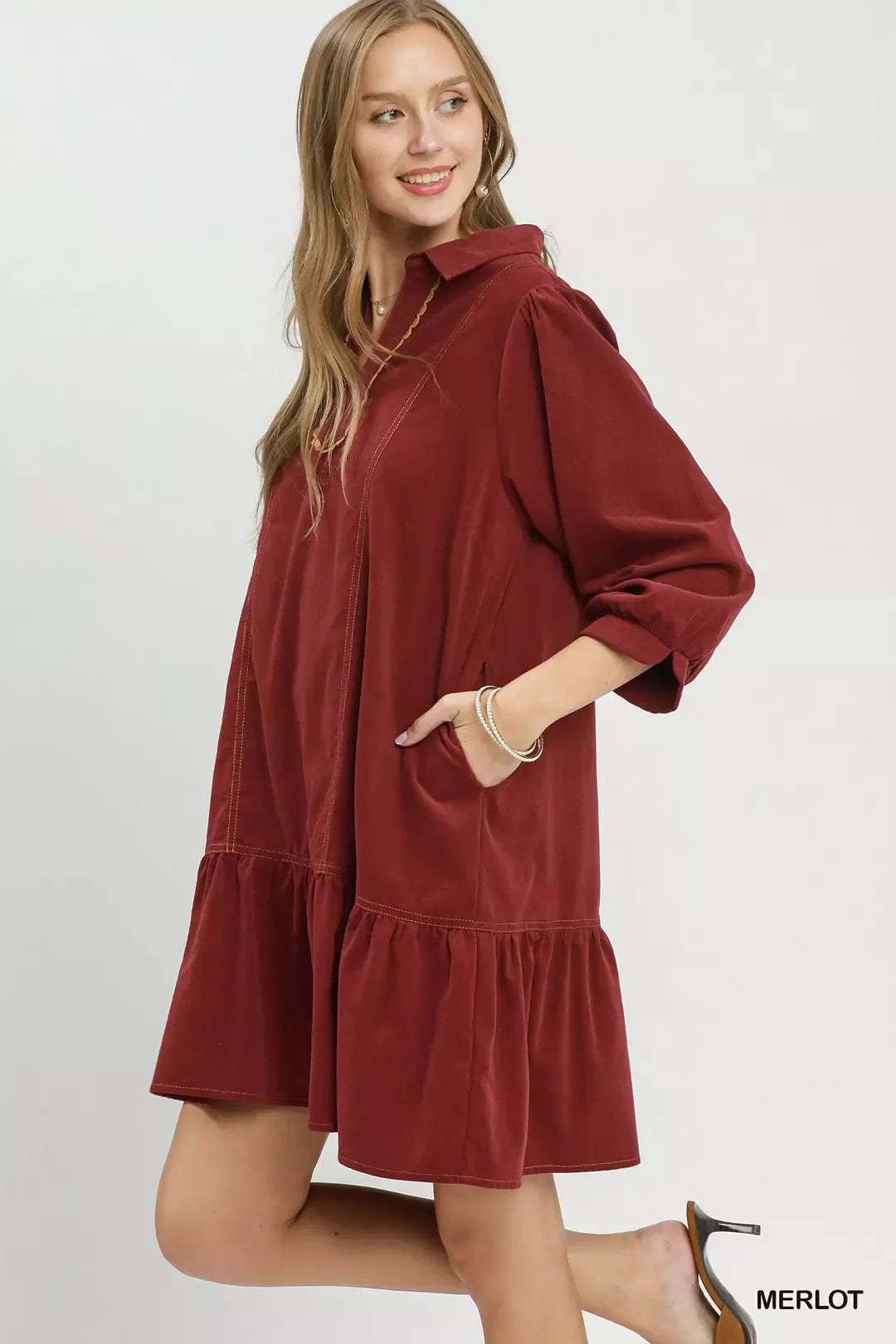 Corduroy babydoll dress showing tiered ruffle layers