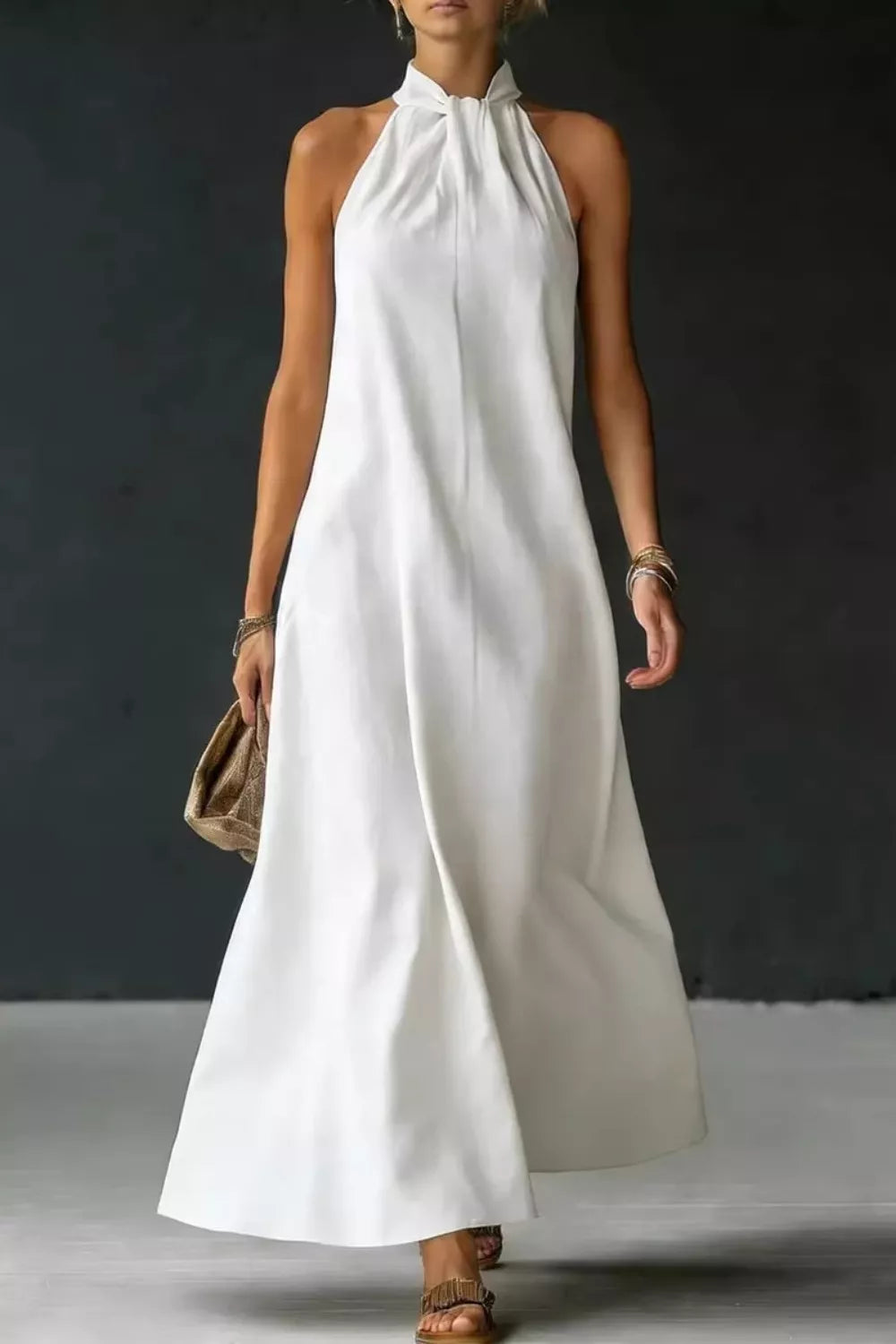 Halter neck sleeveless maxi dress with side slit styled look