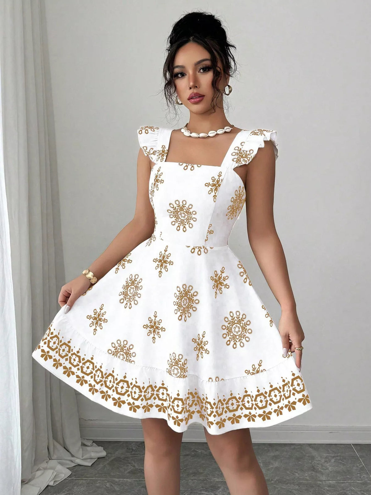 Full length styling shot of the mini dress with sandals