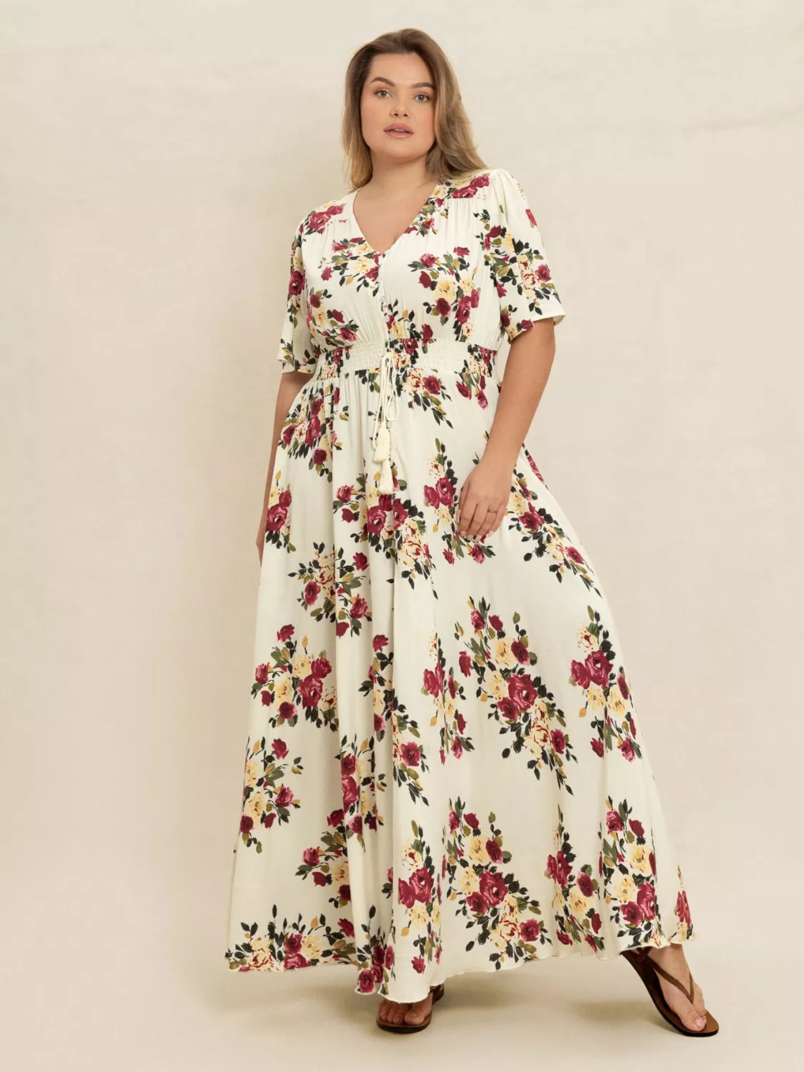 Pastel yellow floral flutter sleeve button front maxi dress back view