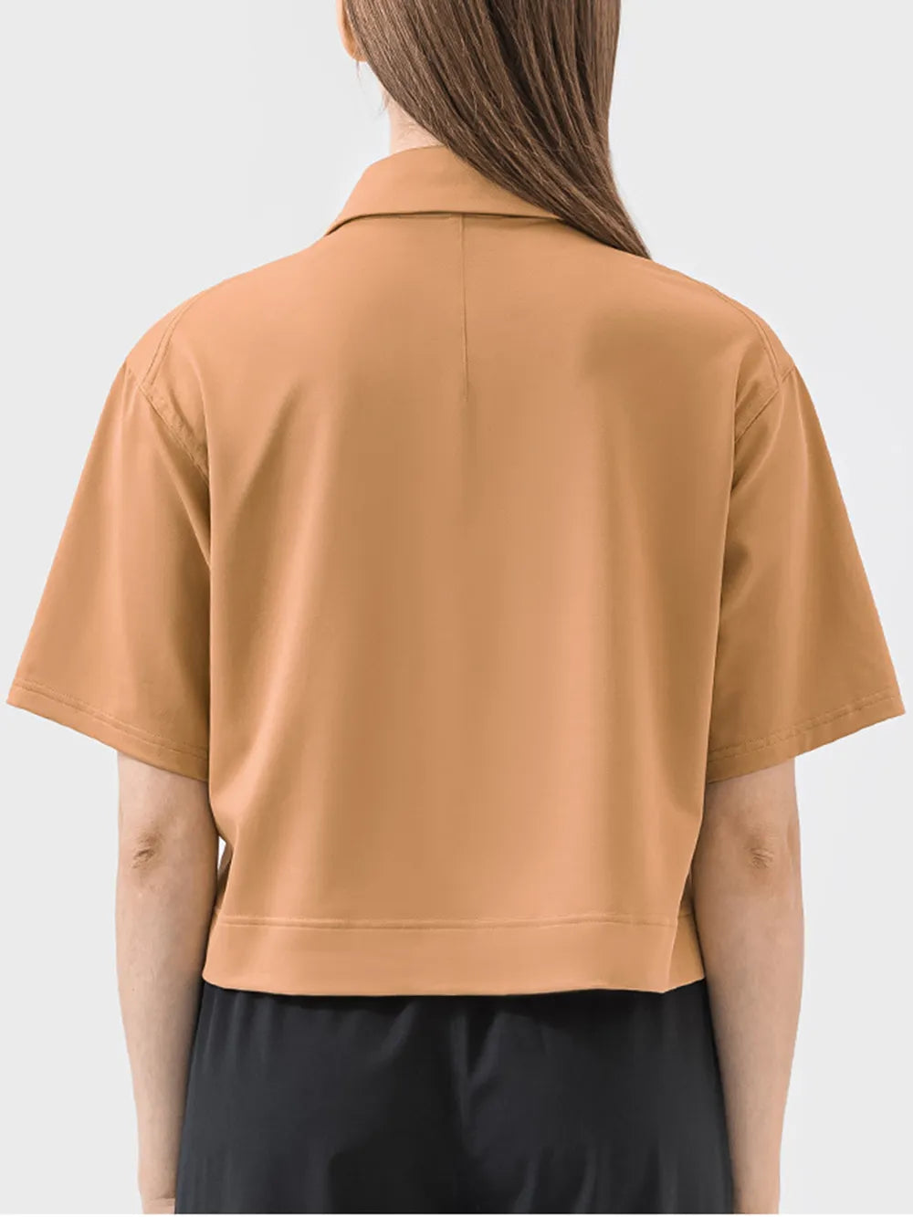 Half button short sleeve active tee side view