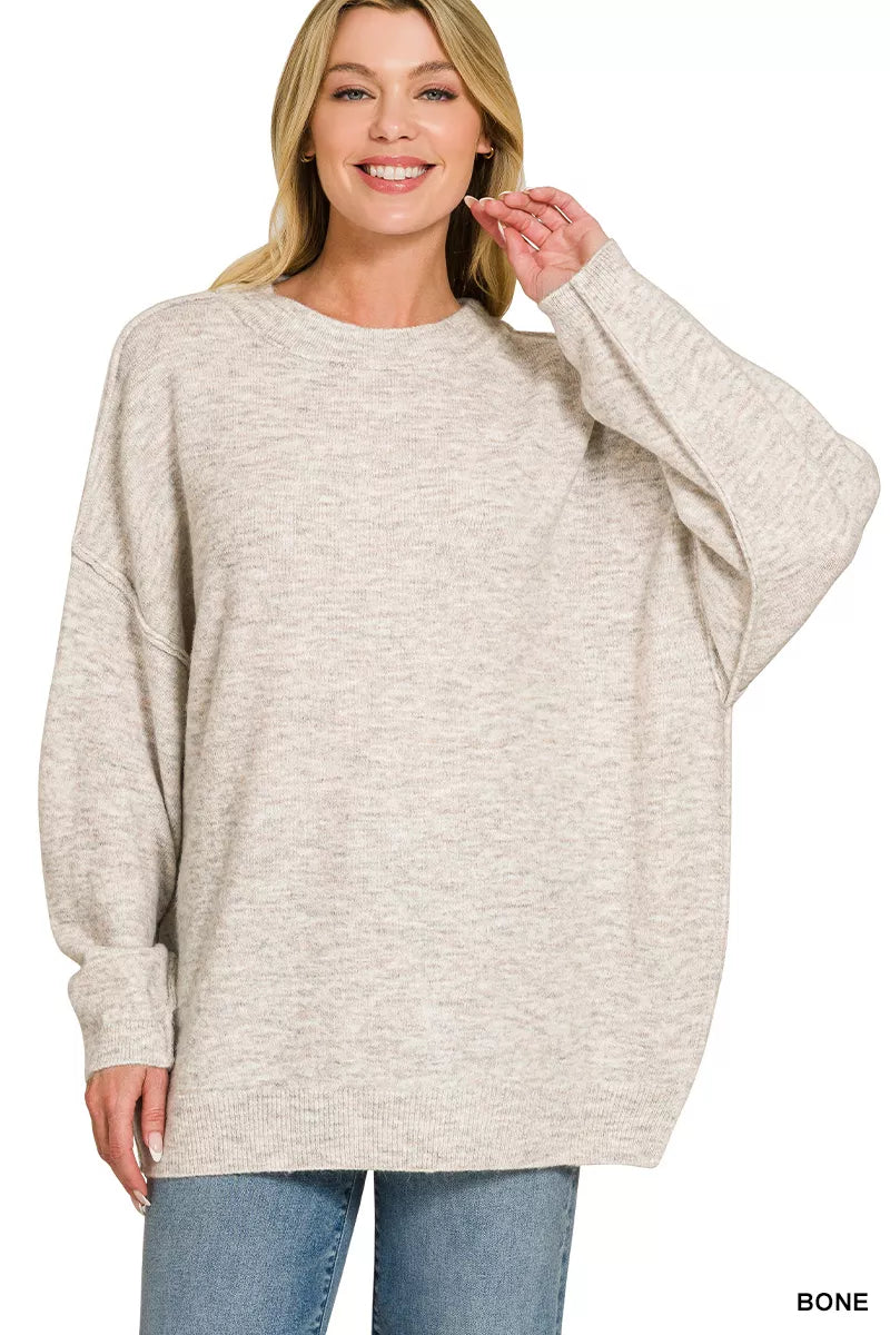 Oversized exposed seam melange sweater in bone front view