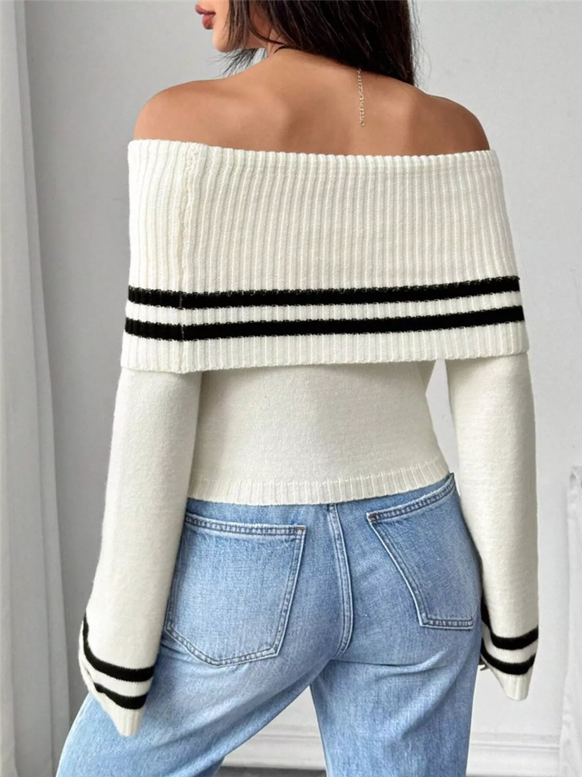 Flare sleeve detail on striped sweater