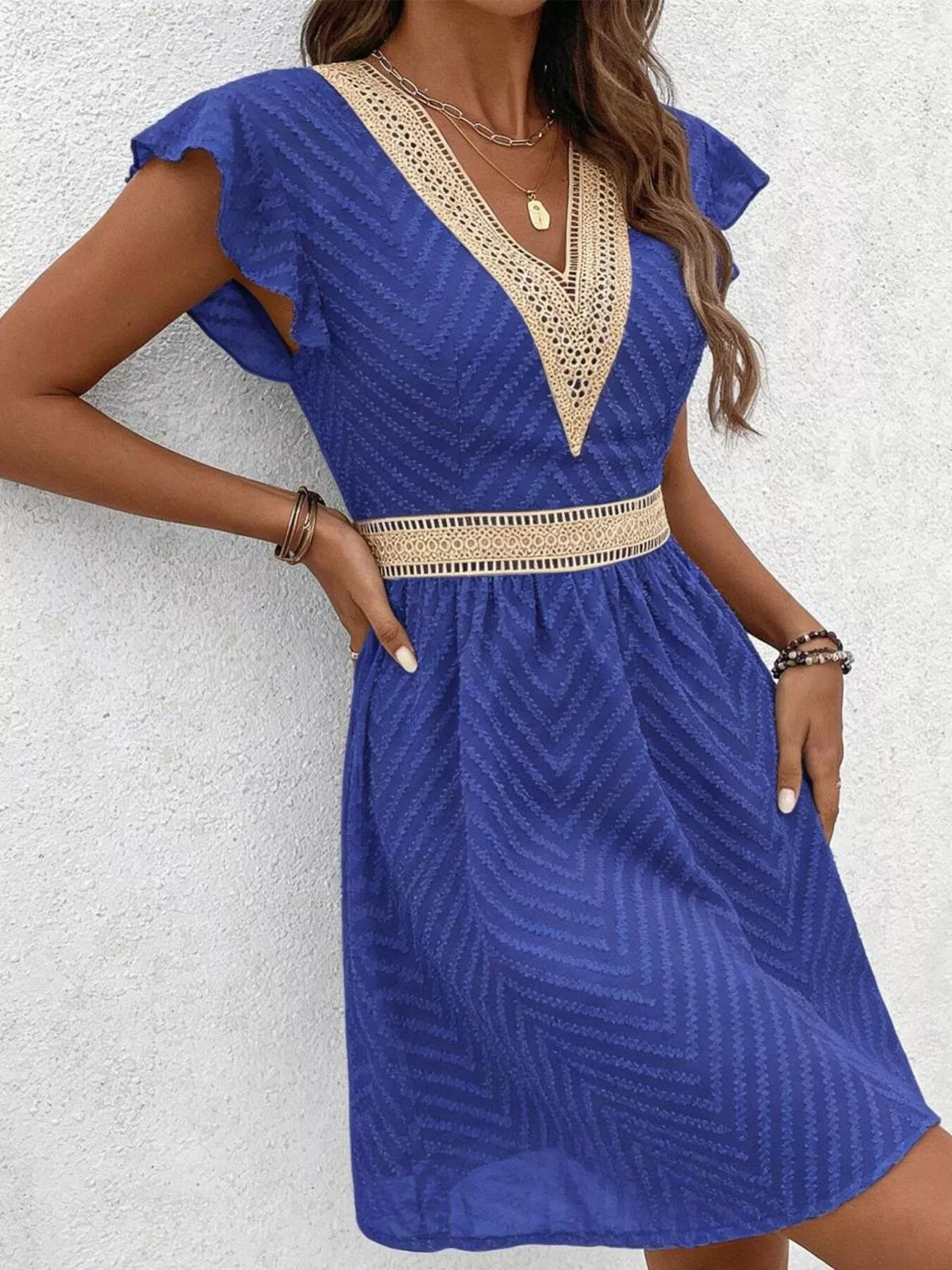 V neck ruffle sleeve mini dress, three quarter view