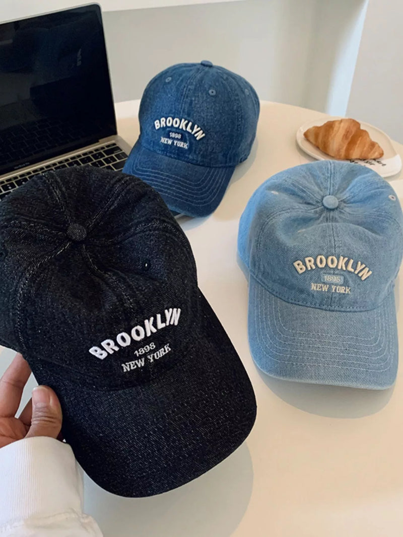 Light blue letter embroidered baseball cap front view