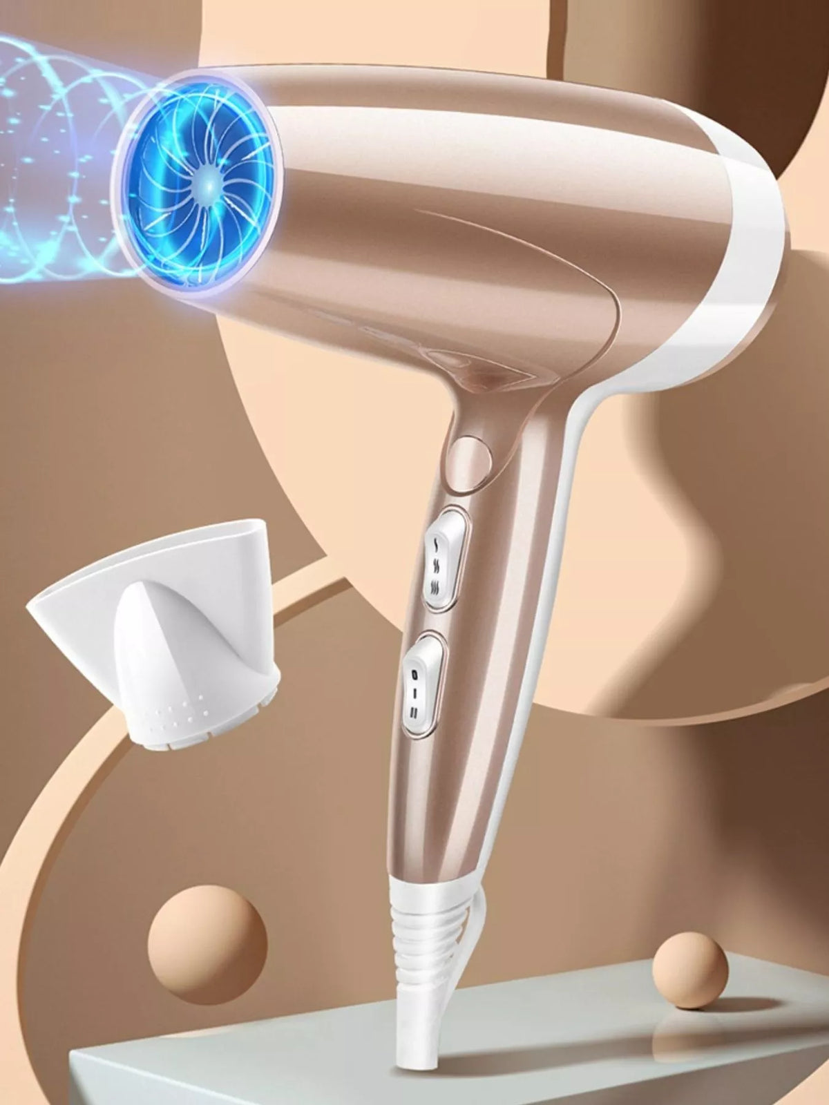 Gold hair dryer held in hand
