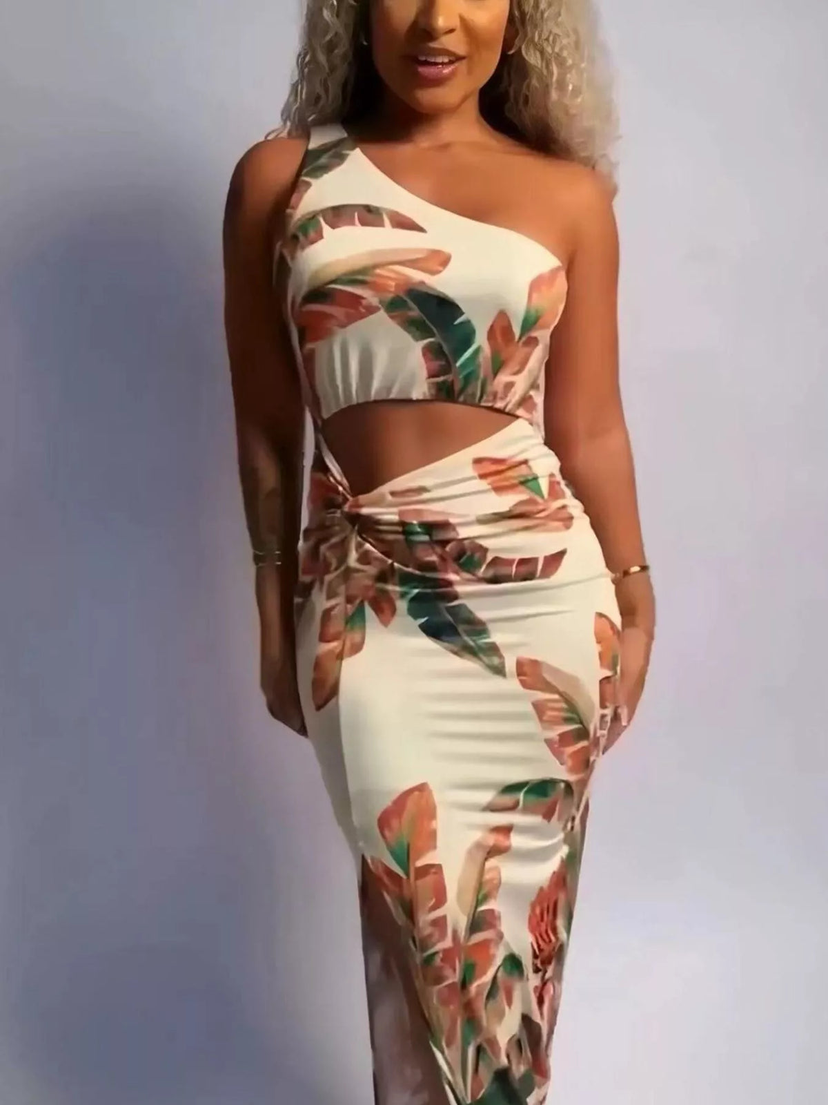 Side view showing the slit on the white maxi dress