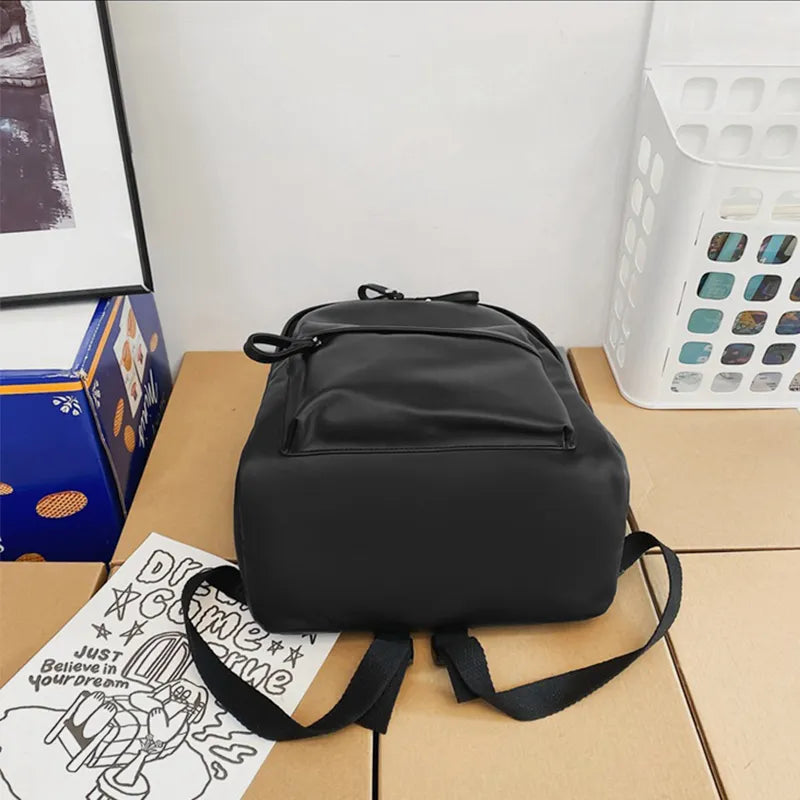 Faux leather zip backpack side profile