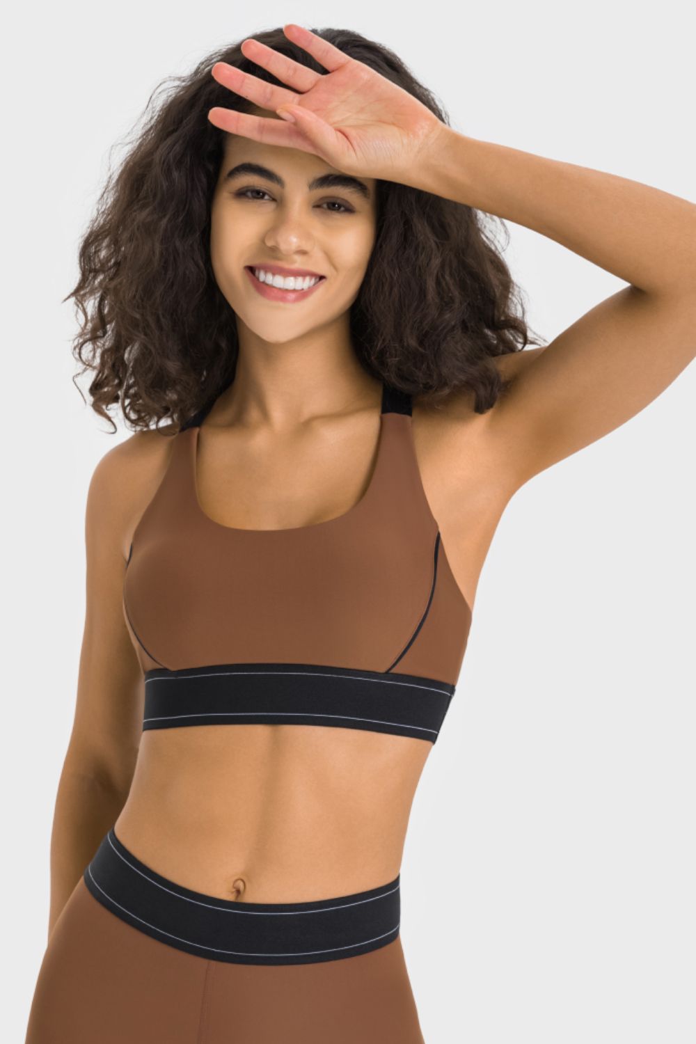 Round neck sports bra styled with leggings