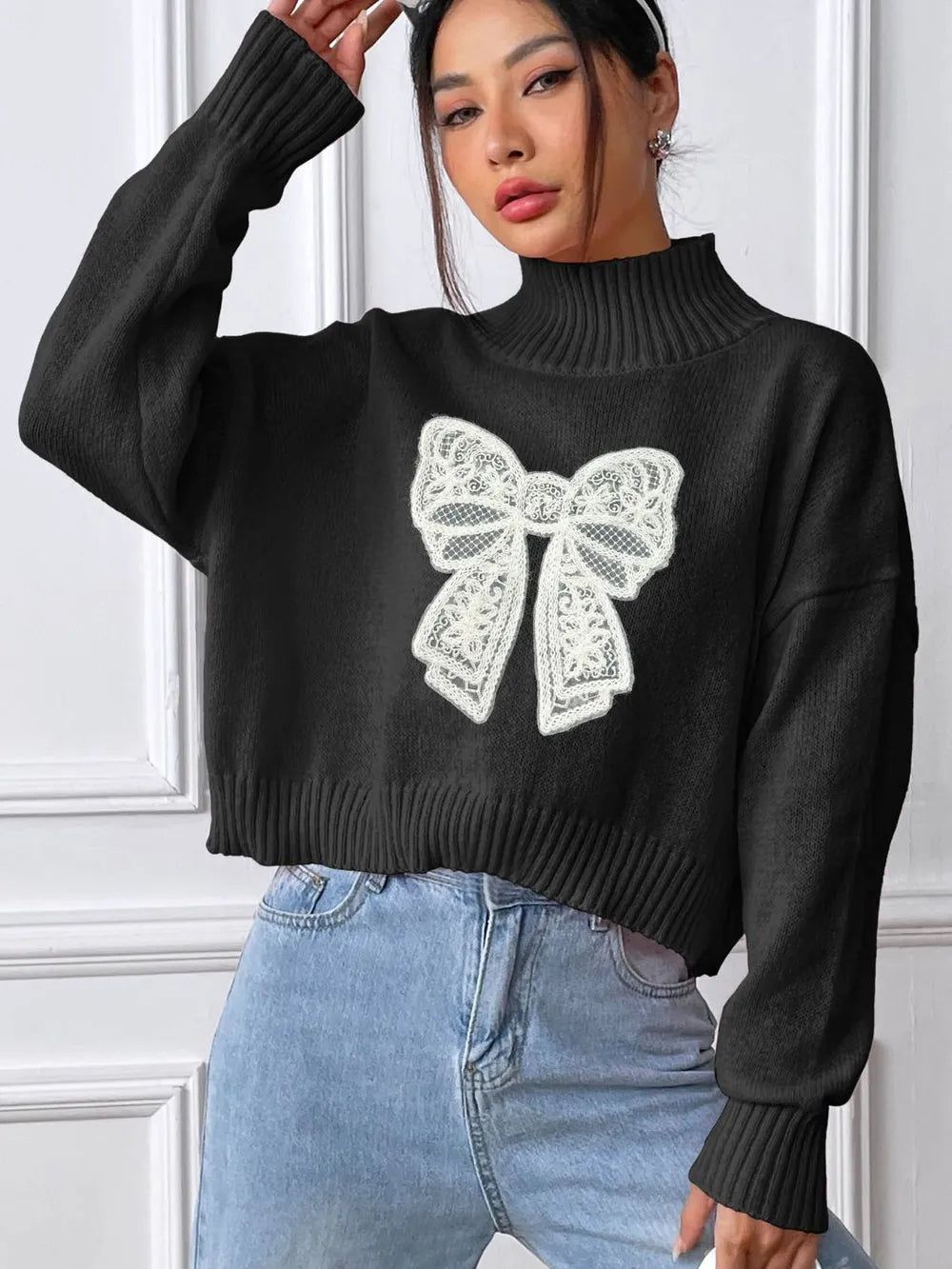 Bow turtleneck long sleeve sweater front view