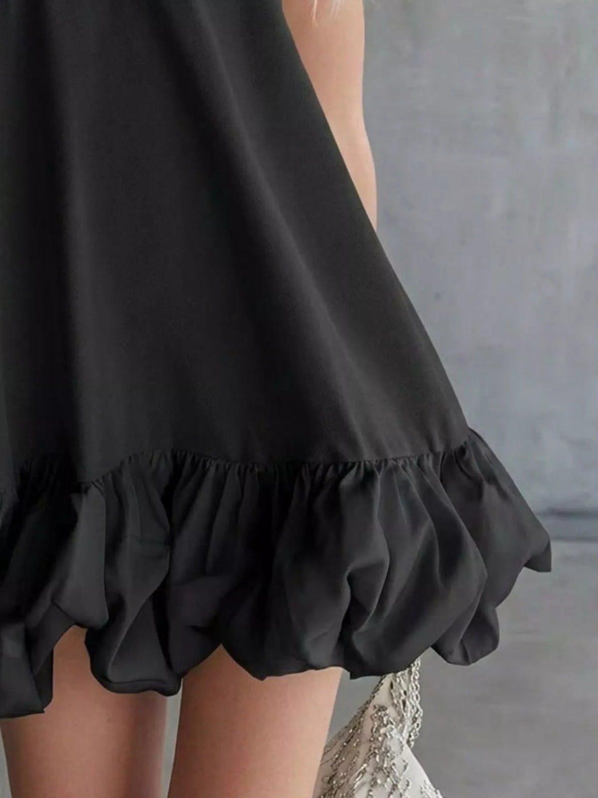 Bubble hem mini dress showing hem detail