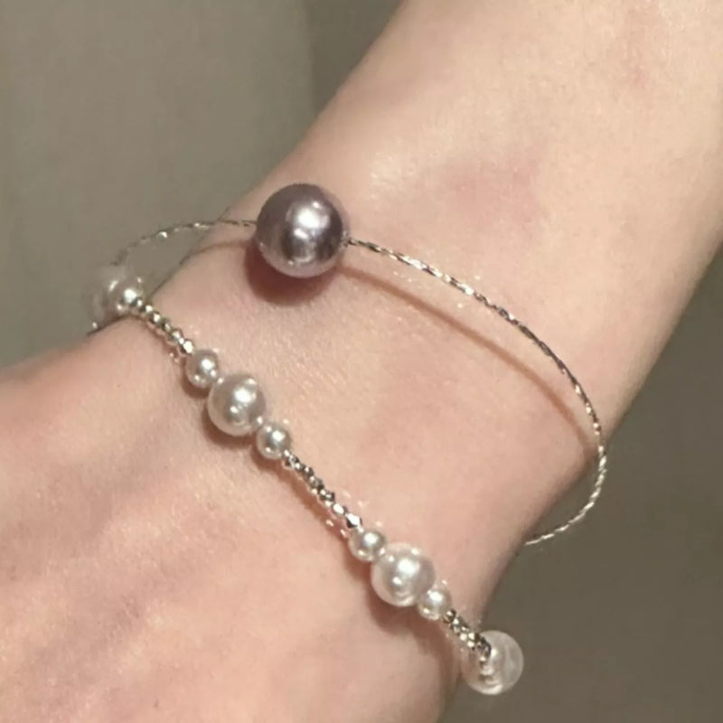 Silver pearl bangle bracelet front view