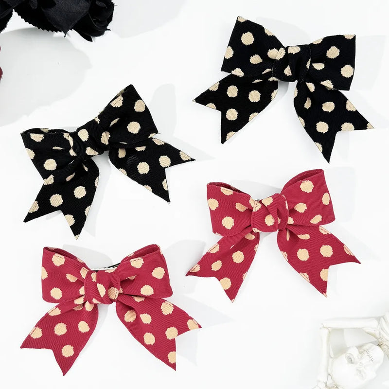 Polka dot bow hair clip set front view