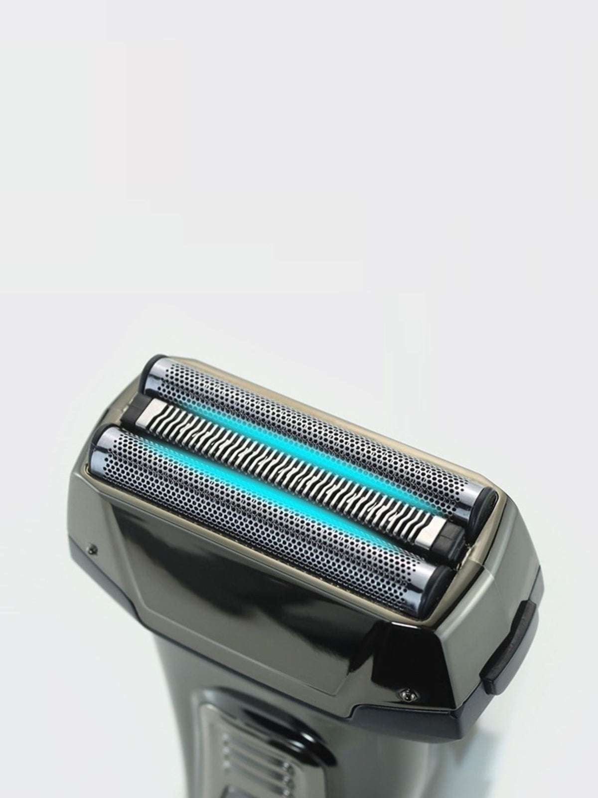 Rechargeable electric shaver on white background