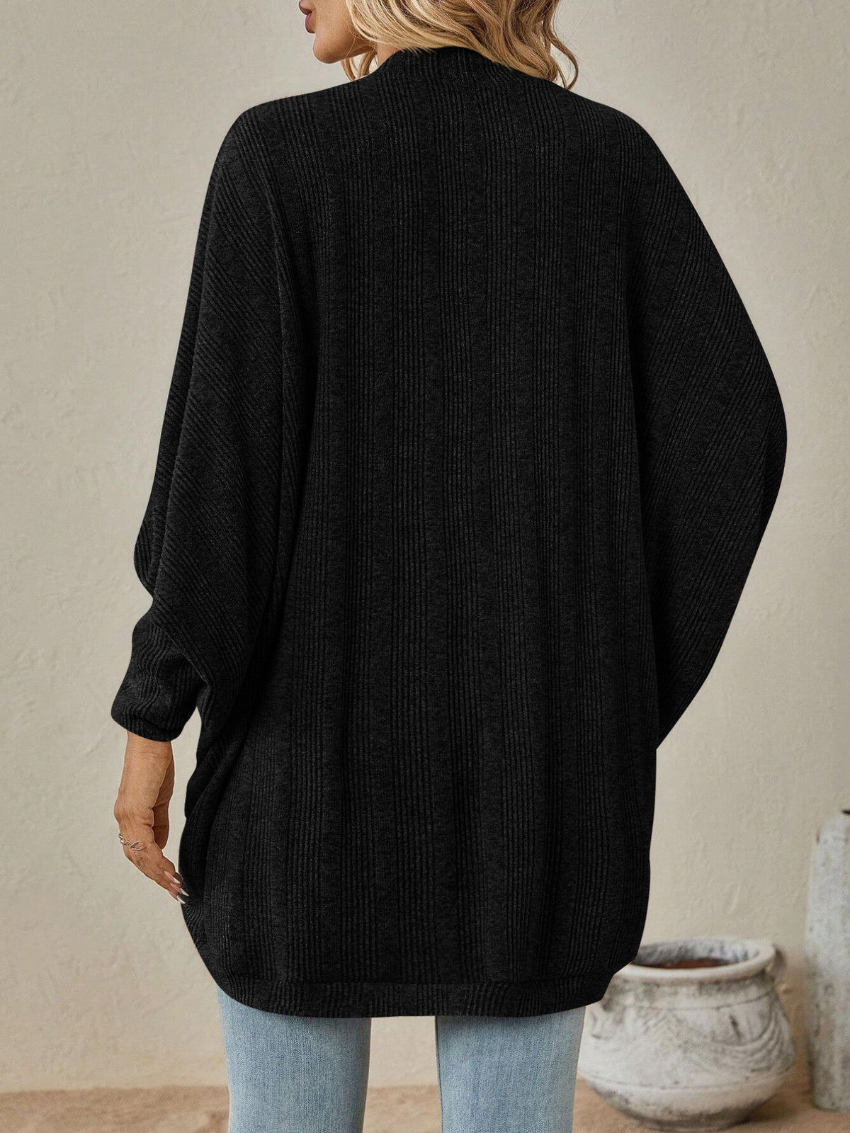 Longline batwing cardigan hem detail