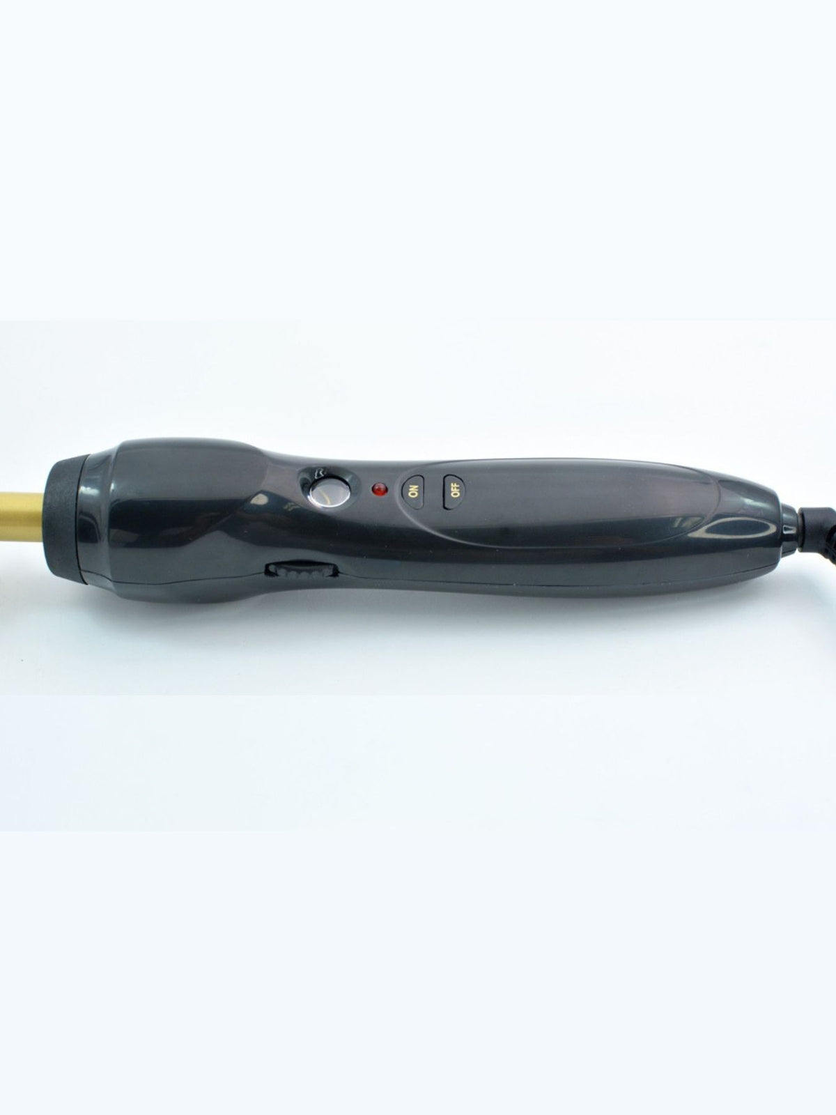 Straightening comb in use on hair