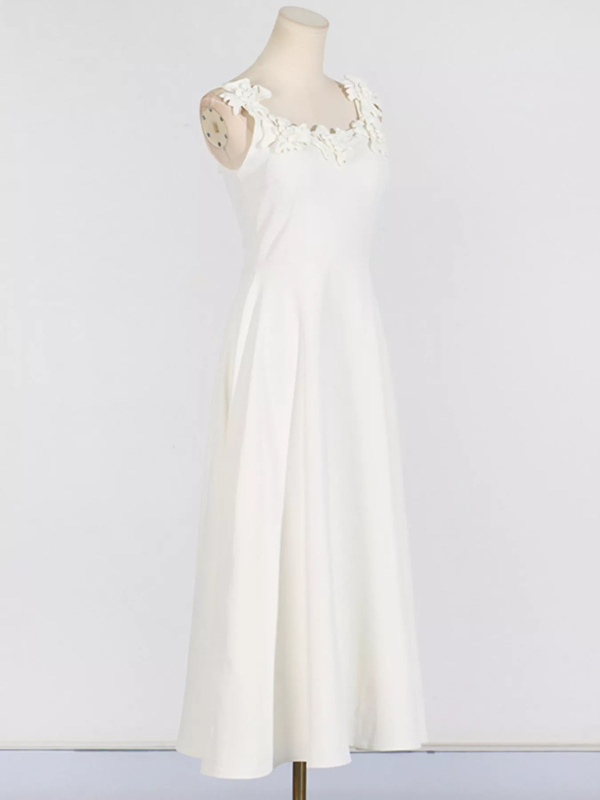 Sleeveless bodice detail on embellished dress