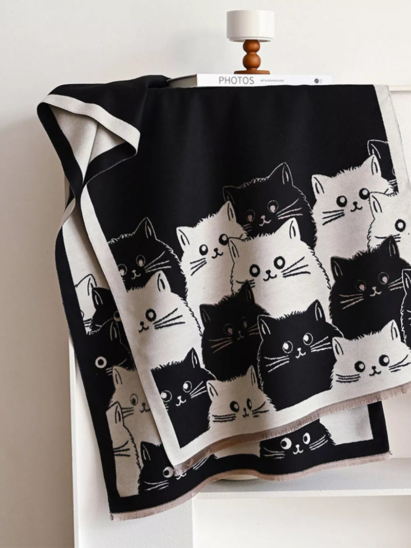 Cute cat pattern knitted scarf shown at full length