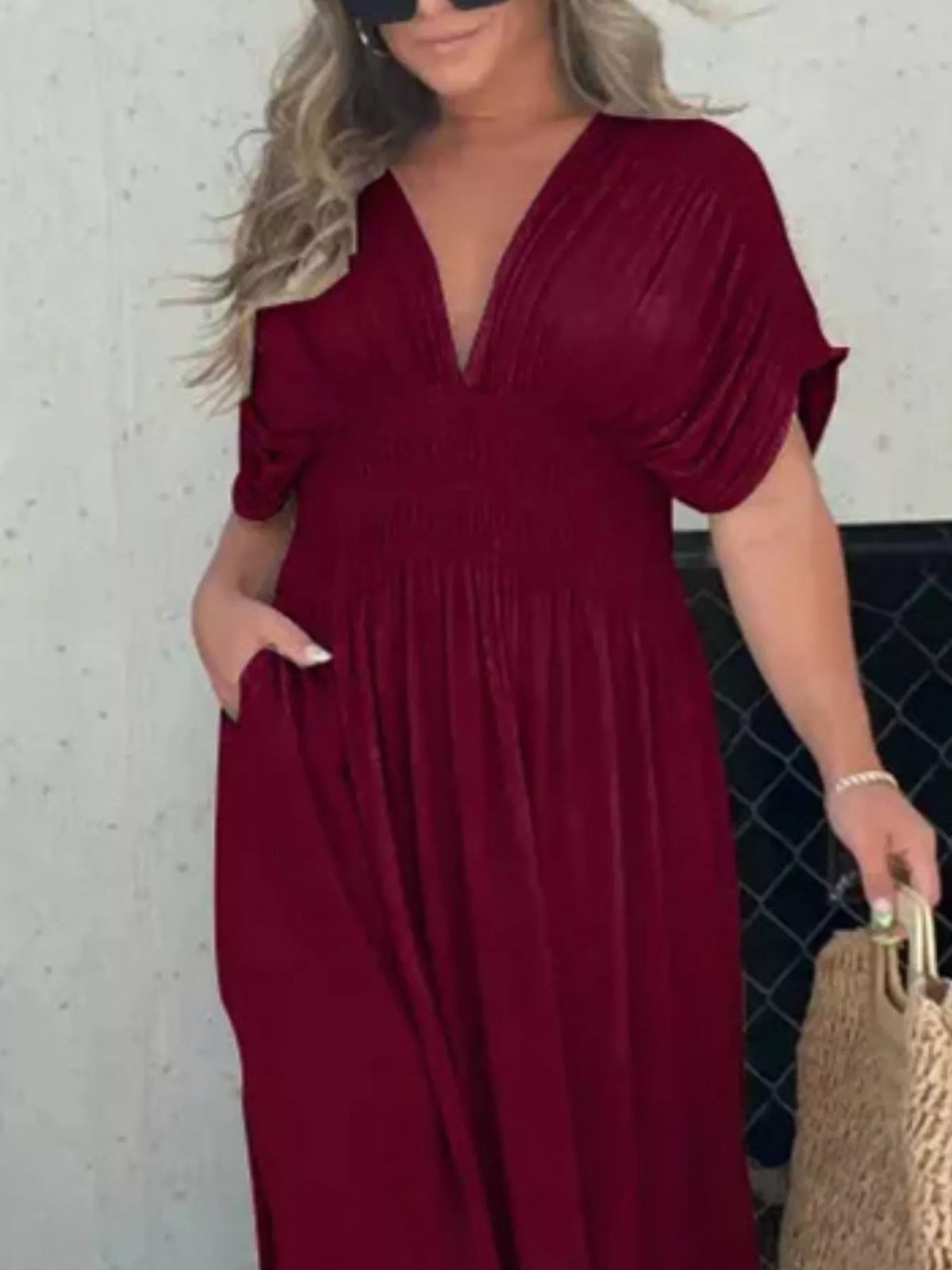 Slit V neck smocked waist maxi dress movement shot