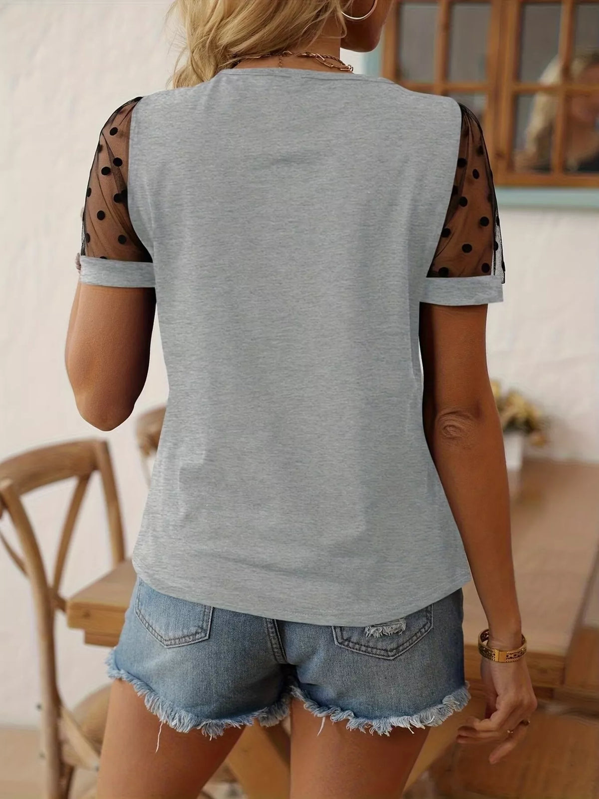 Black polka dot mesh sleeve t shirt front view