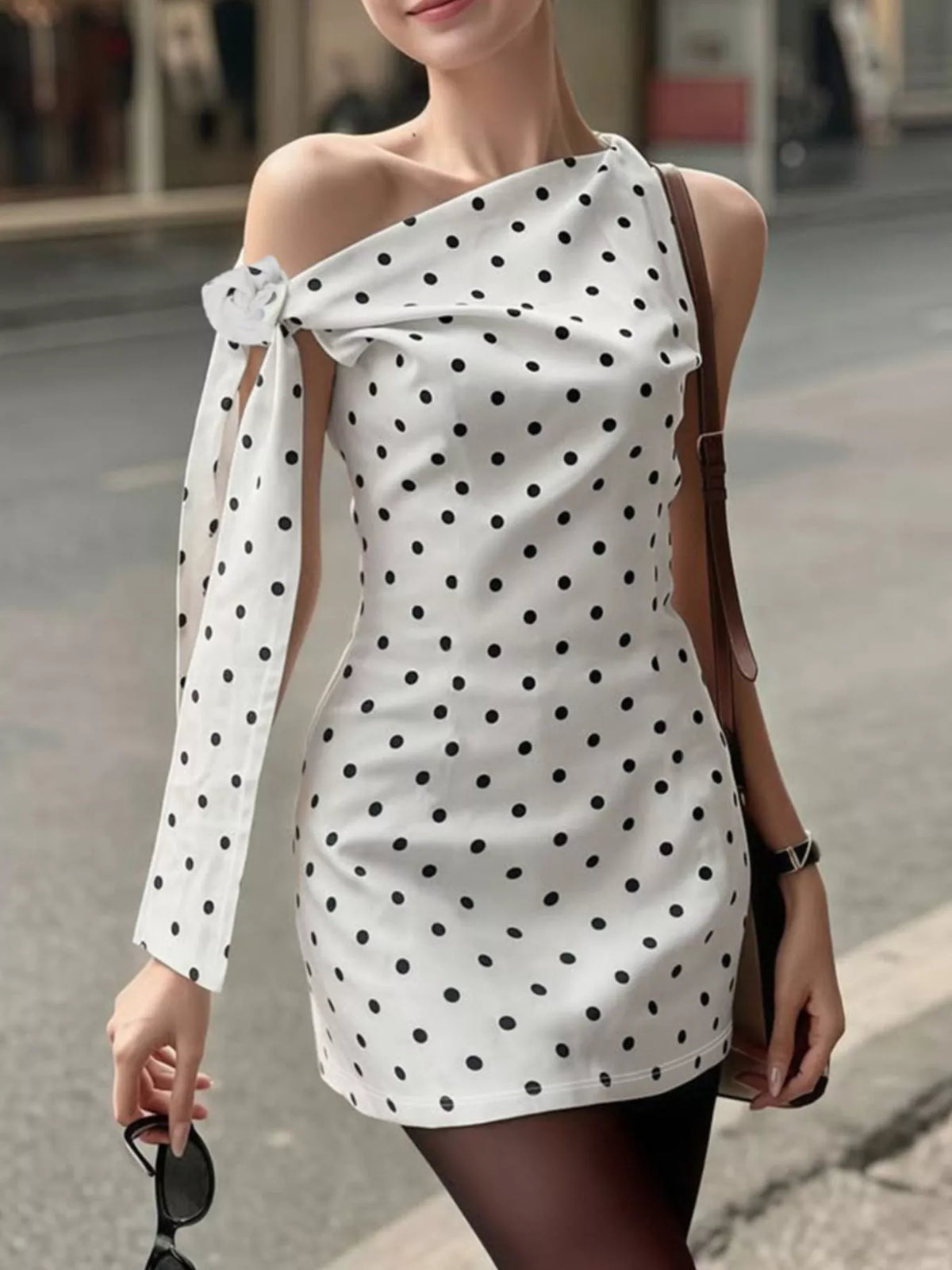 Polka dot print fabric close up on the white dress