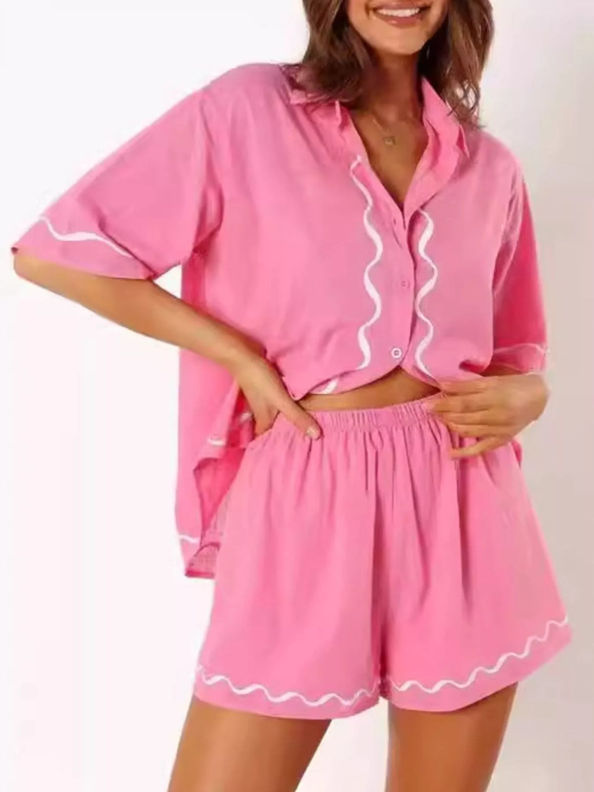 Pink matching shirt and shorts set side view