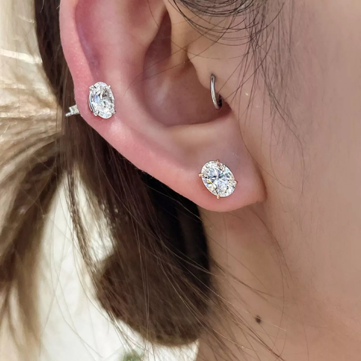 Sterling silver stud earrings with the matching box