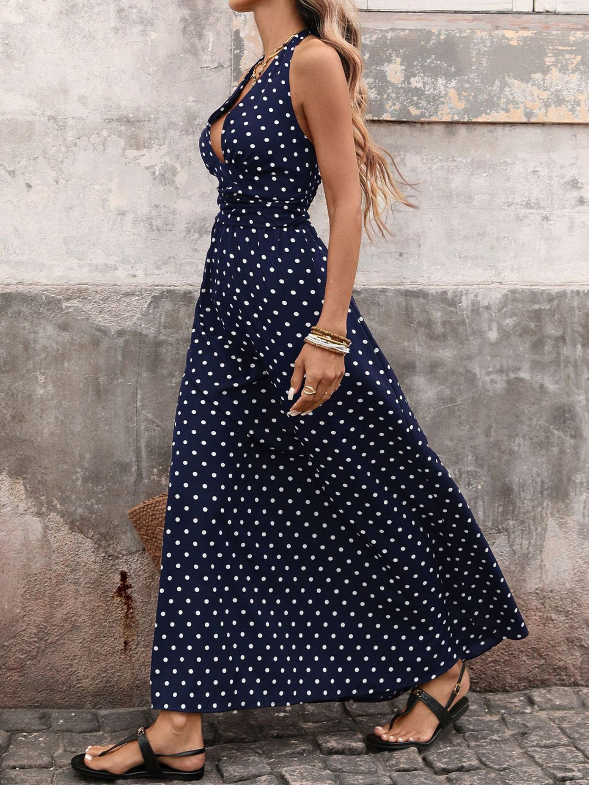 Polka dot halter neck maxi dress, seated styled view