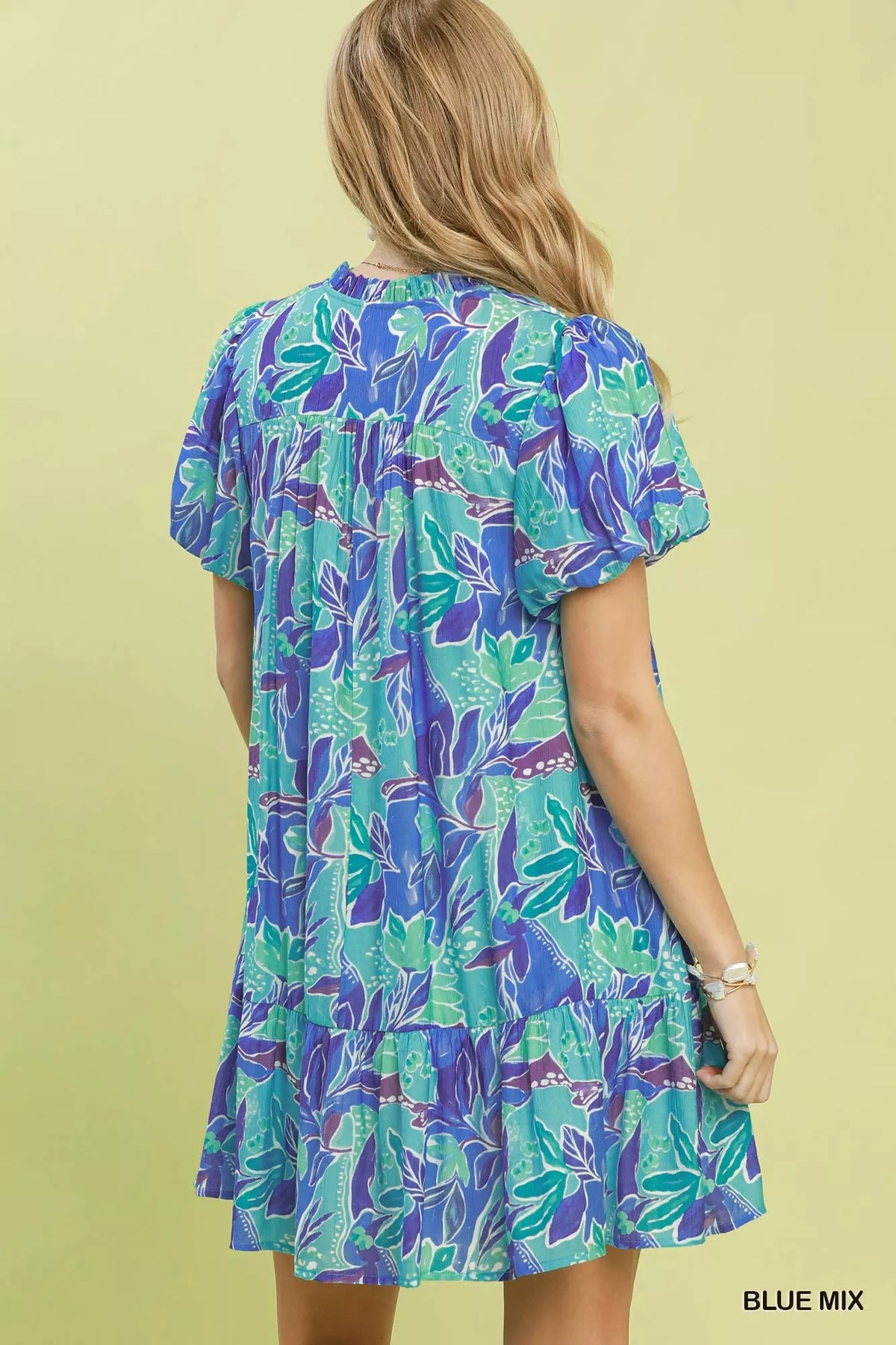 Blue tropical floral mini dress puff sleeve side view