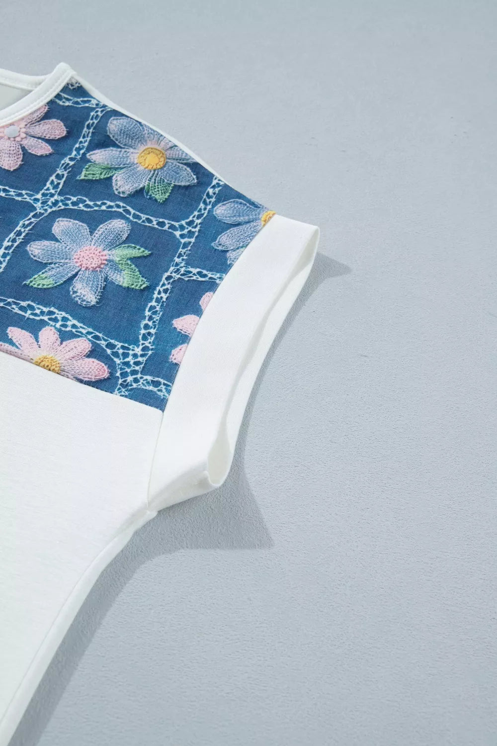White floral tee neckline detail