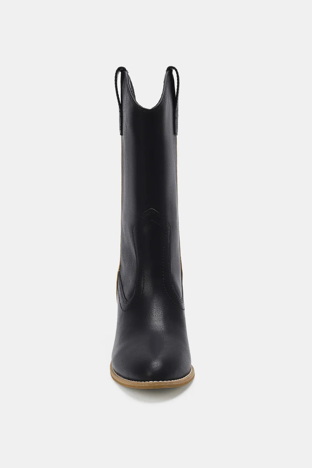Butterfly cut out point toe boots styled on model