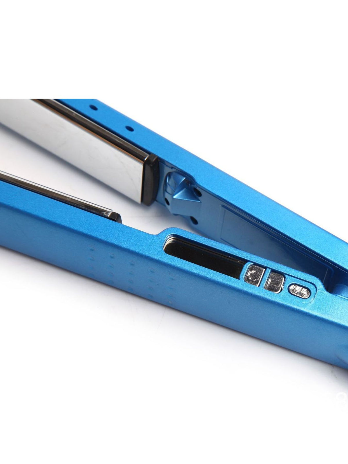 Hair straightener held in hand