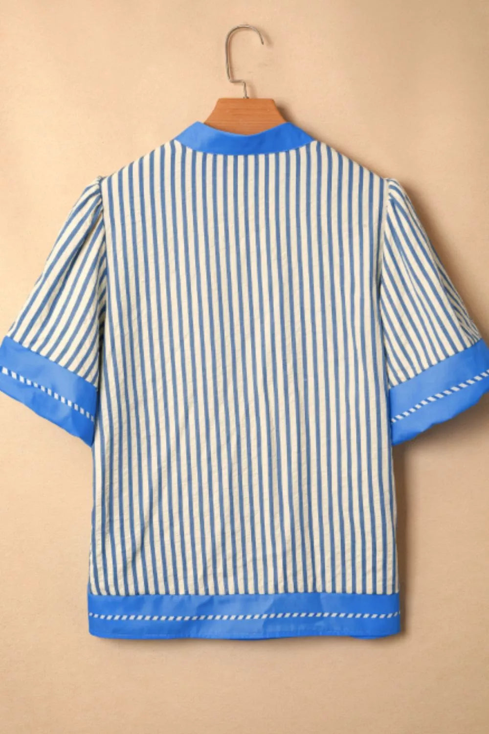 Blue striped color block V neck short sleeve blouse detail of the fabric