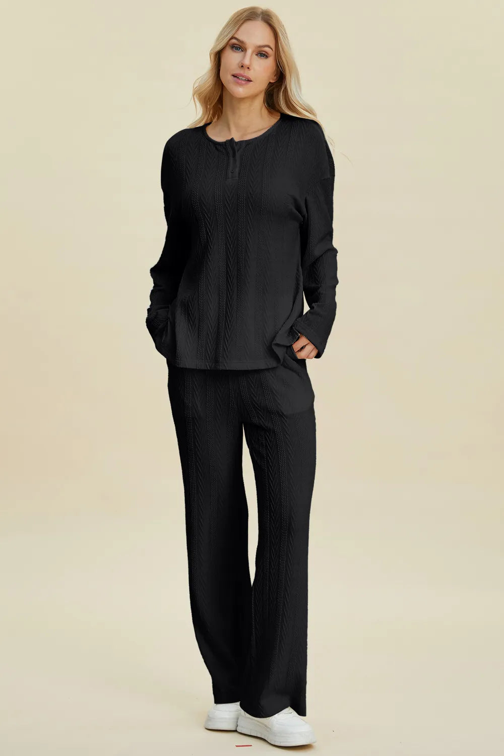 Side view of the two piece knit top and pants set