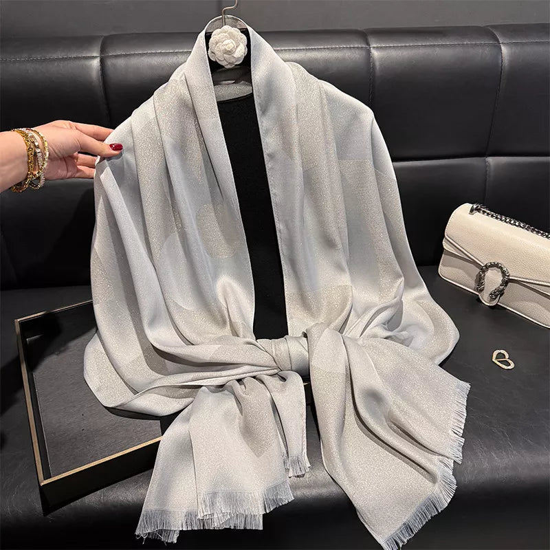 Lightweight wrap scarf shown at full length
