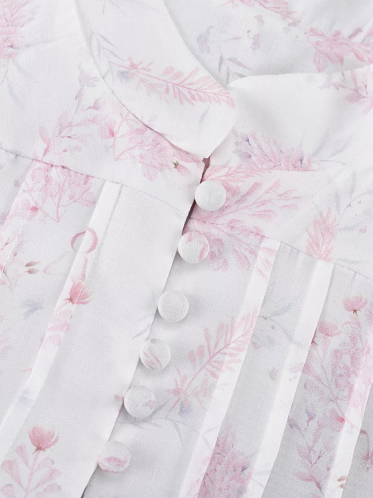 Floral print fabric texture on the blush dress