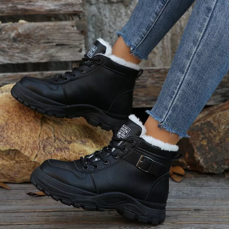 Warm lined buckle ankle boots angled view