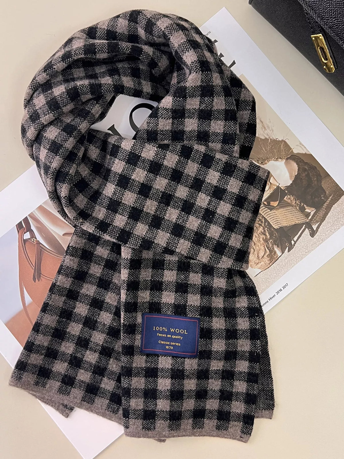 Detail of soft wool weave on the plaid scarf