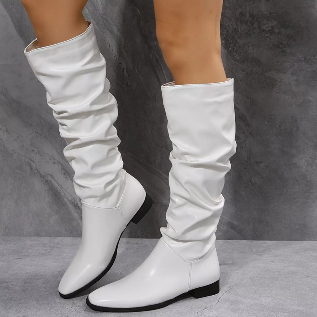 White slouchy block heel boots back heel view