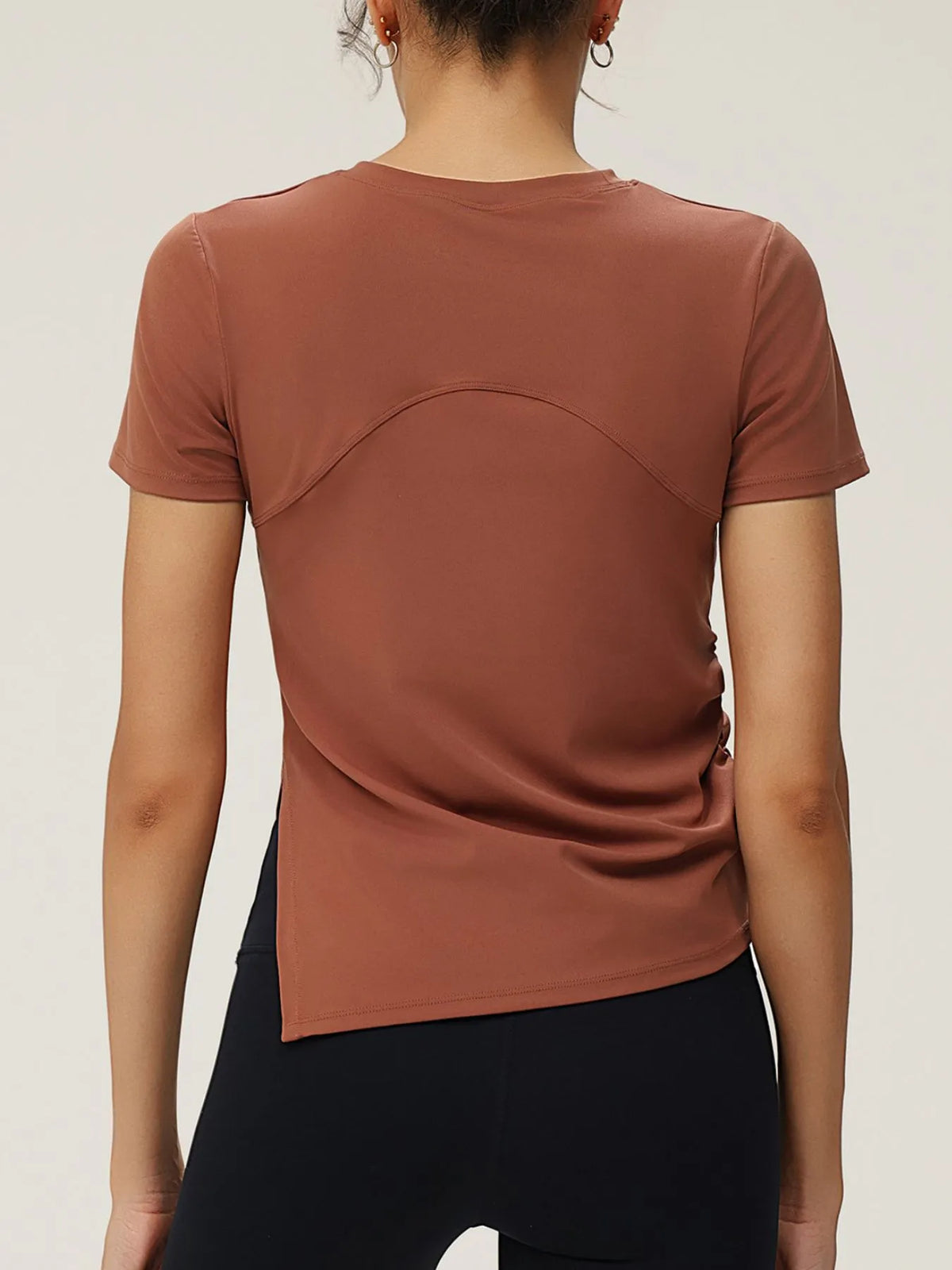 slit round neck short sleeve active tee styled on model