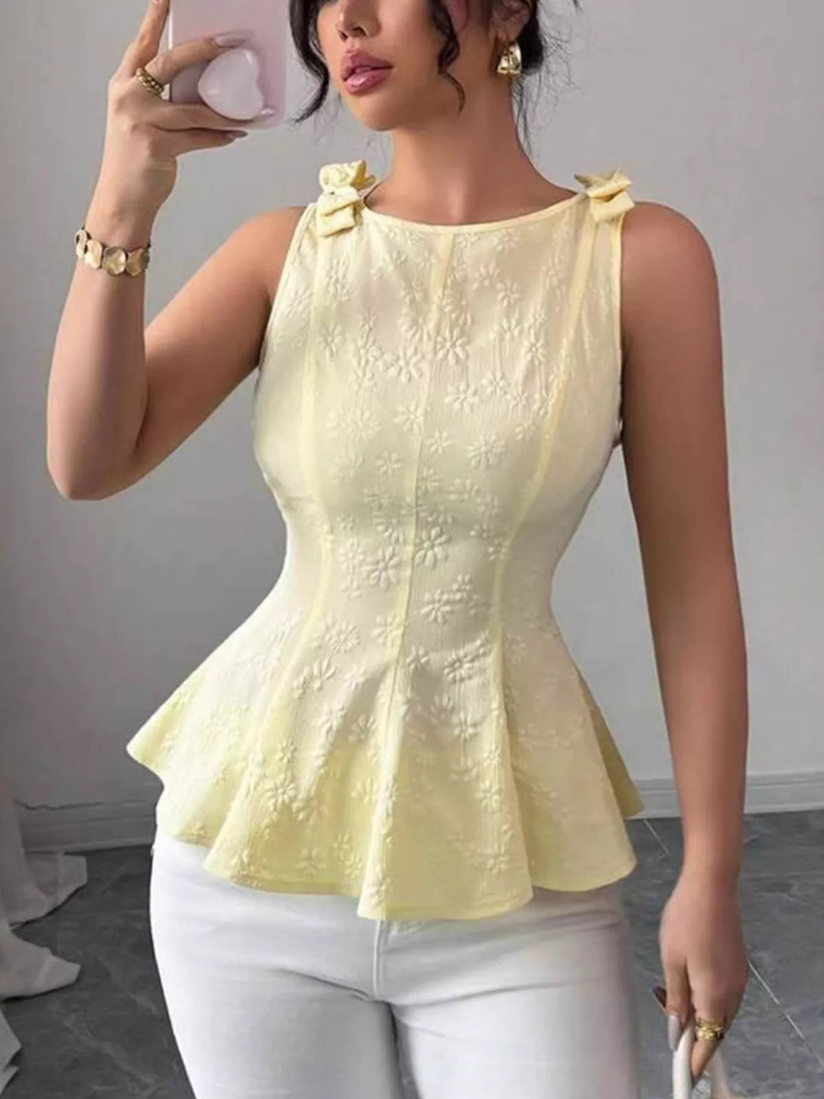 Bow shoulder peplum tank top side view