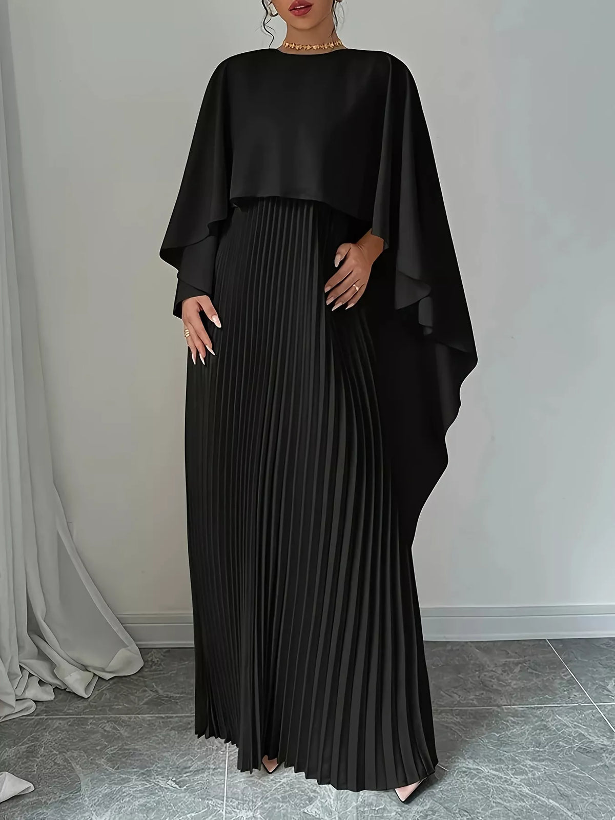 cape sleeve pleated maxi dress fabric close up