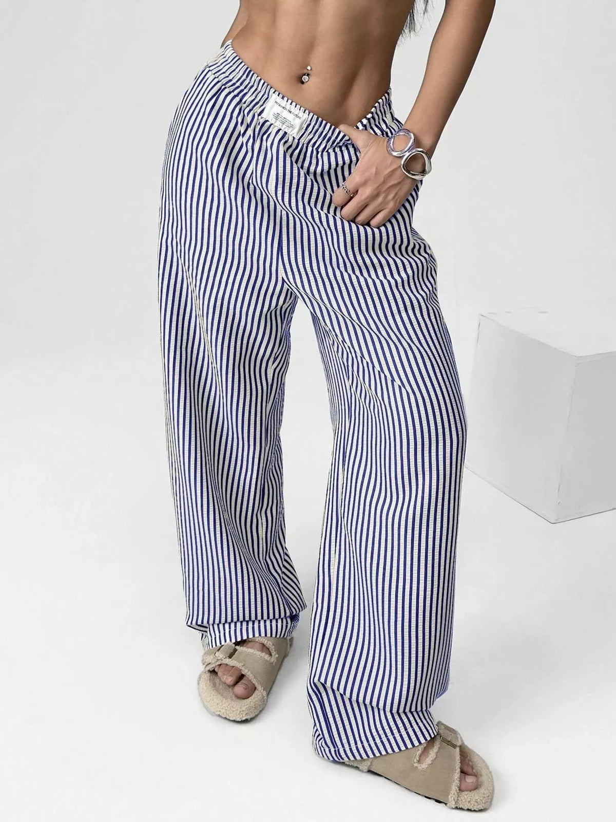 Striped high waist wide leg pants, close up of the detail