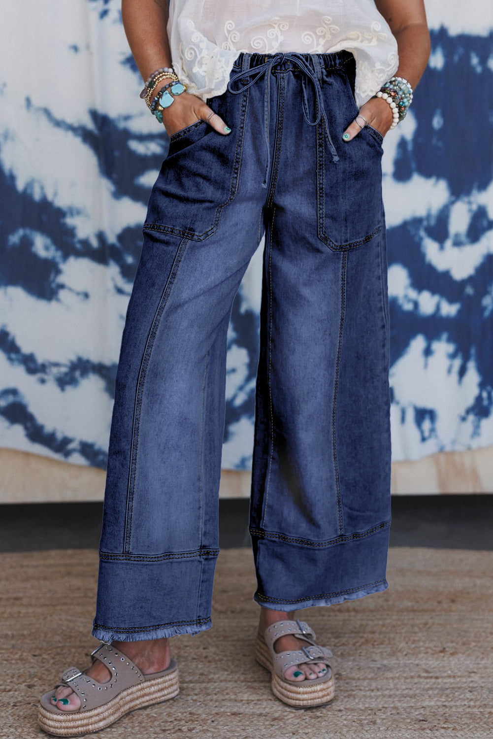 Wide leg jeans raw hem and ankle detail