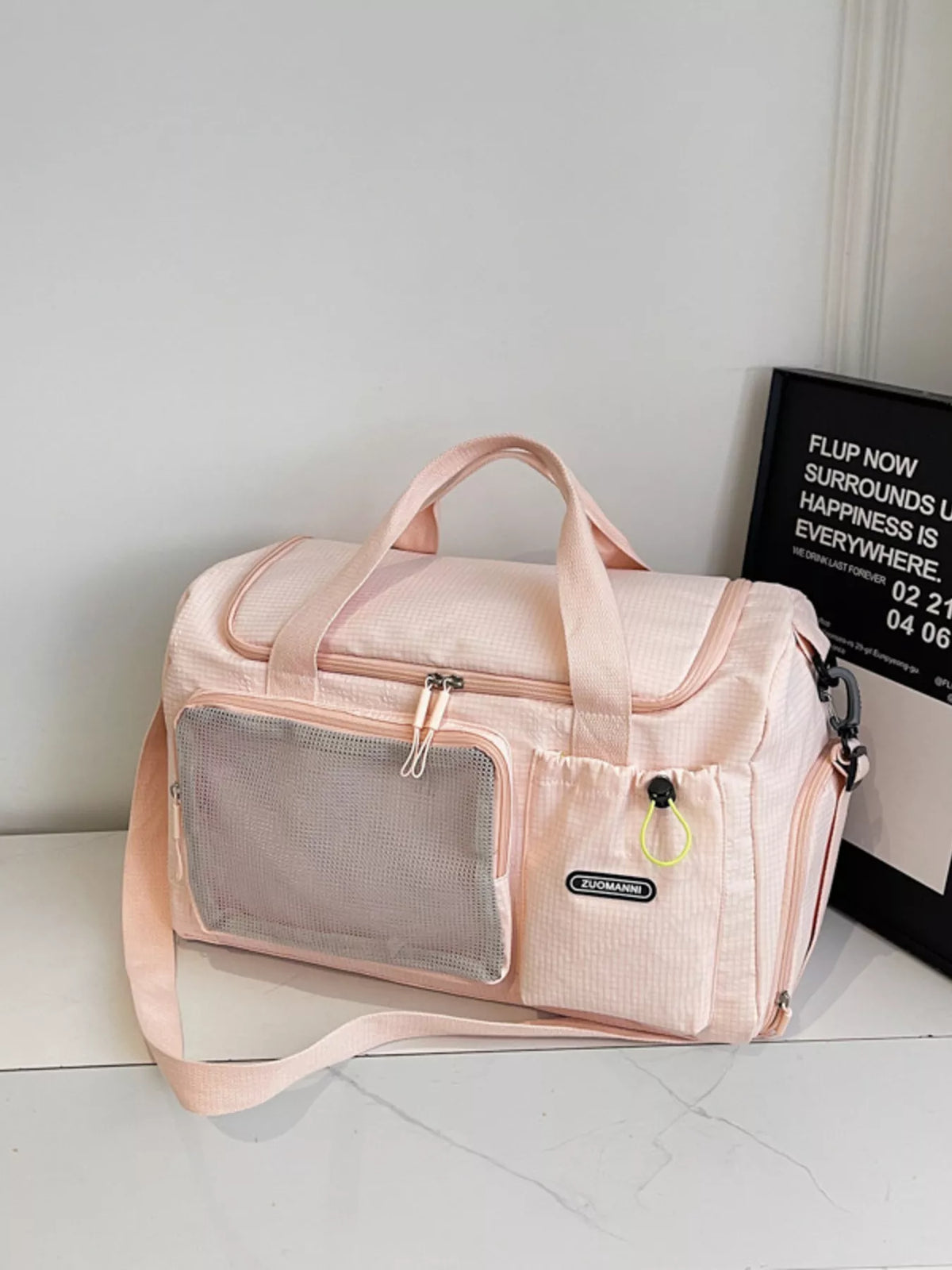 Travel duffel bag side profile with pockets