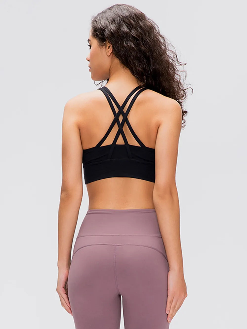 Crisscross scoop neck active tank shoulder detail