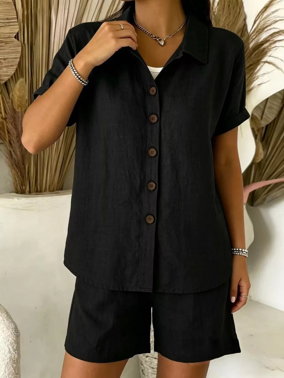 Shirt and shorts set styled with flat sandals