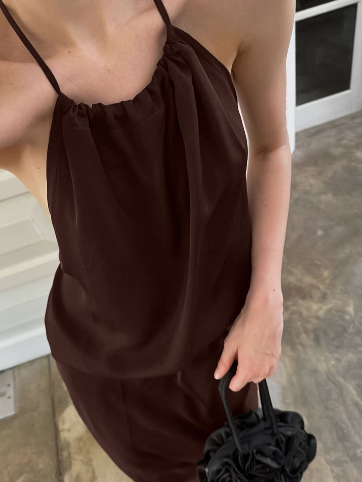 brown backless halter neck maxi dress side view
